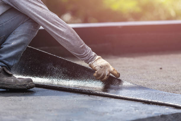Professional Basement Waterproofing technician working in Huntsville, AL